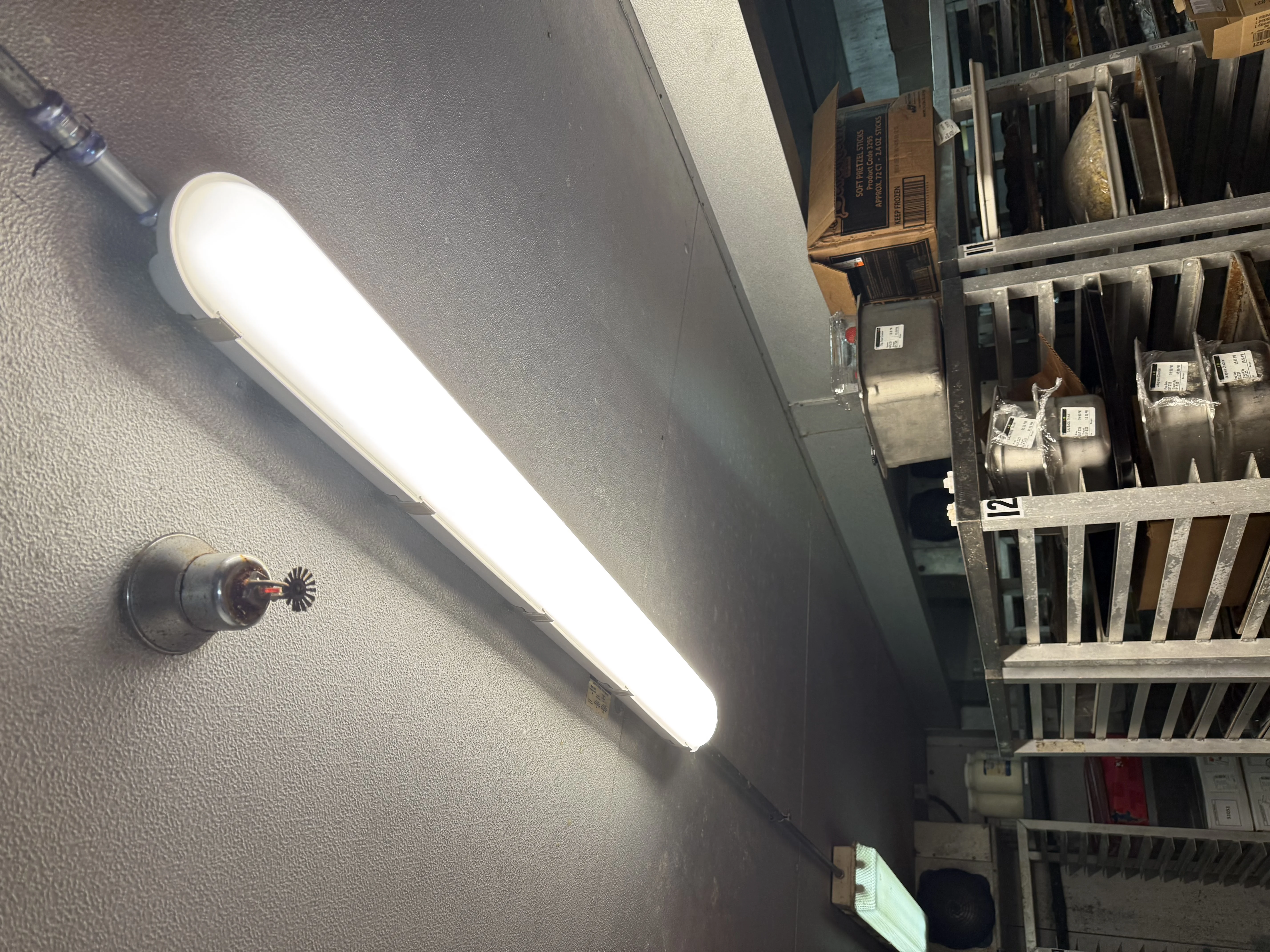 Hopkins Electric installed linear LED fixture, custom mounted on a finished wall